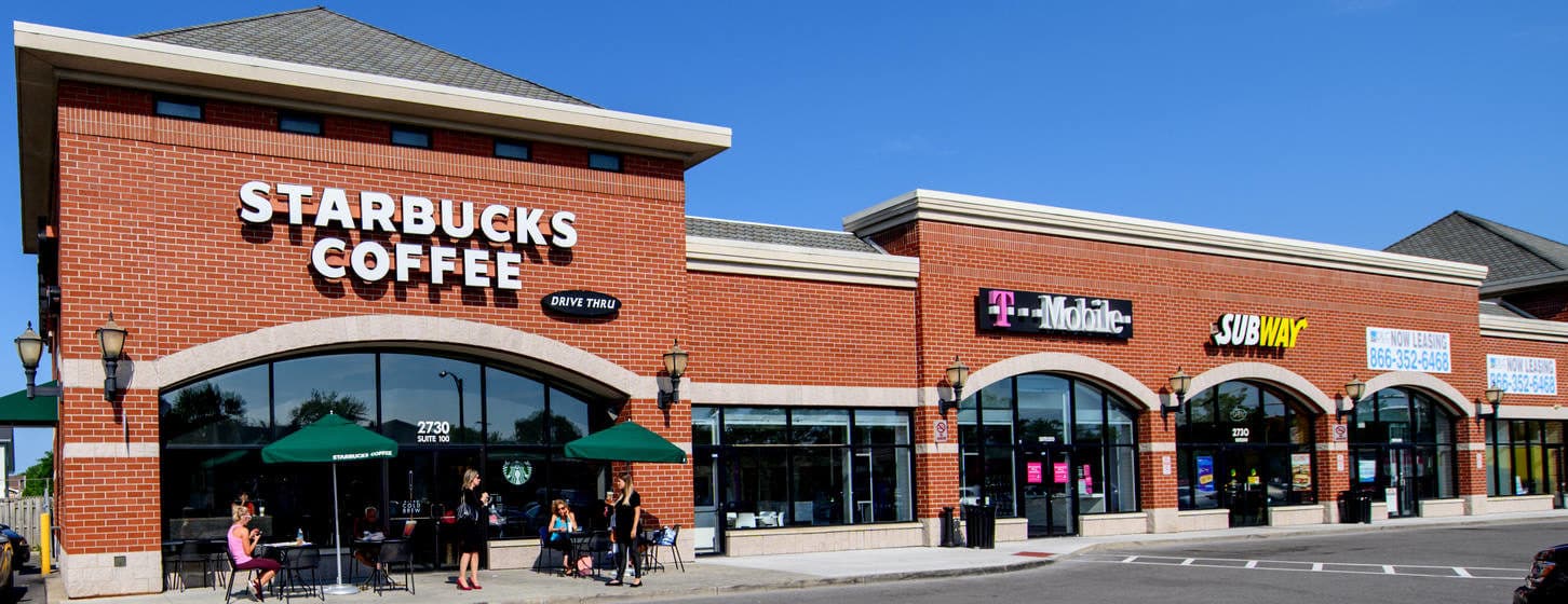 Shopping center with Starbucks Coffee, T-Mobile, and Subway