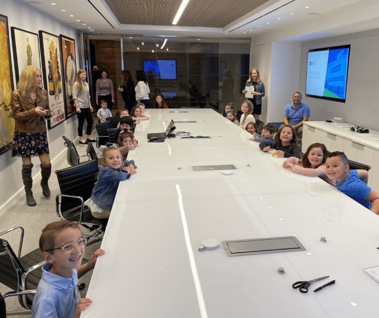 group shot of kids at work for take a kid to work day